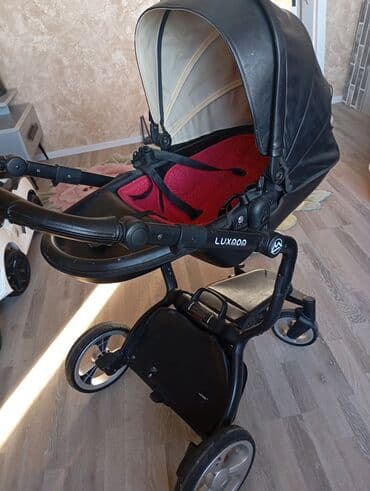 qara kedlər: Uşaq arabası – LUXMOM - Rəng: qara (qırmızı daxili oturacaq/yataq — 1