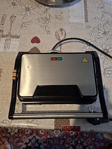 ucuz modem: Elektrik tost/sandviç presi aparatı satılır. İstəyən əlaqə saxlasın — 5