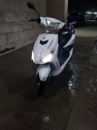 купить мопед бу: Şəhər içi üçün yığcam və çevik skuter. Xüsusiyyətlər: - Kuzov rəngi — 2