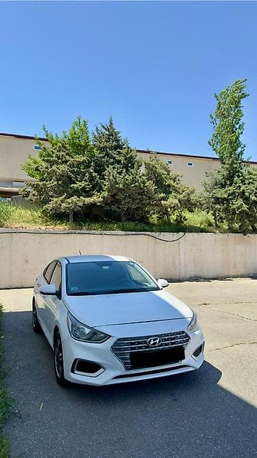 safari n: Hyundai Accent: 1.6 l | 2019 il Sedan — 5
