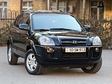 bmw e39: Hyundai Tucson: 2 l | 2007 il — 5