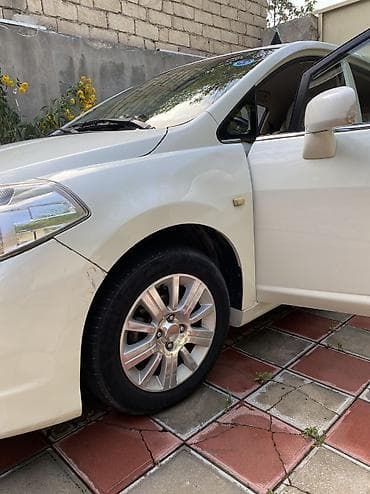 Продажа авто: Nissan Tiida: 1.5 л | 2011 г. Хэтчбэк — 8