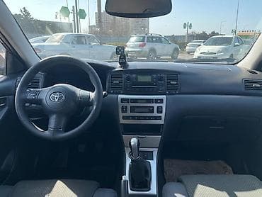 05 masin: Toyota Corolla: 1.5 l | 2006 il Universal — 3