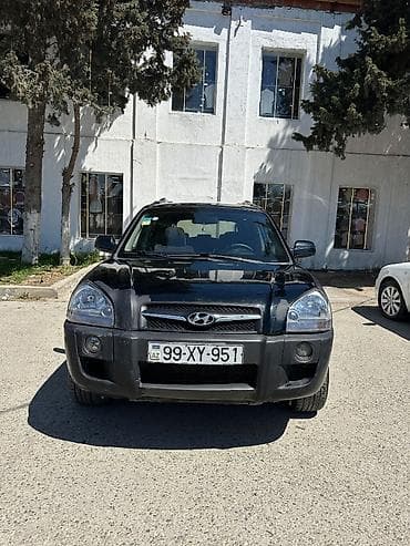 kar: Hyundai Tucson: 2 l | 2009 il Ofrouder/SUV — 1