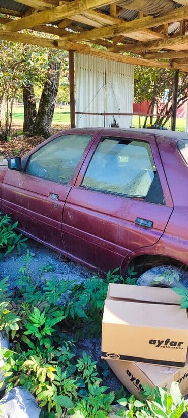 запчасти на форд фокус 1: Ford Orion sedan – 4 qapı, bənövşəyi/qırmızı rəng. Nömrə: 55-BH-883 — 5