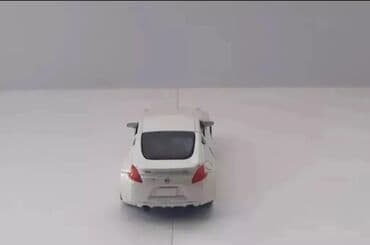ayı çanta: Təcili Satılır. Endirim Var. Nissan 370z Cupe modelka satılır.Ağ — 2