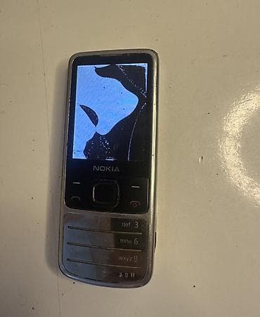 telefonu nokia 6700 telefonu al: Nokia 6700 Slide, rəng - Gümüşü, Düyməli — 3