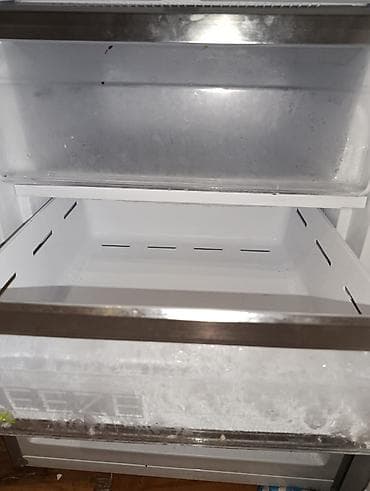 Soyuducu Midea 2 il işlənilib. Hec bir siniği pasi yoxdur. Səliqəli — 2