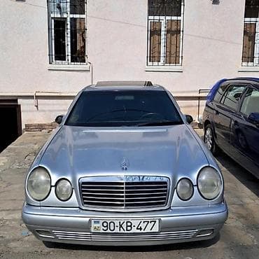bmw e60 m: Mercedes-Benz E-Class: 2.8 l | 1997 il Sedan — 1