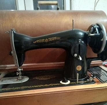 elektro gitara satilir: Yenidir. Mexaniki tikiş maşını – klassik model, qara laklı metal gövdə — 1