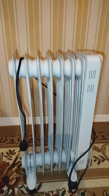 Yağ ilə işləyən elektrik radiatoru - 7 bölməli, döşəmə tipli model -