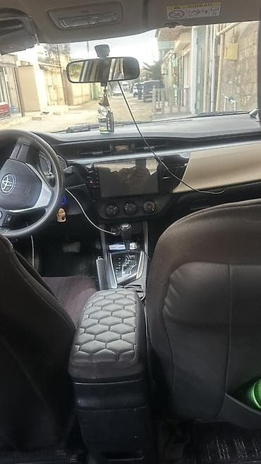 e class: Toyota Corolla: 1.6 l | 2015 il Sedan — 5