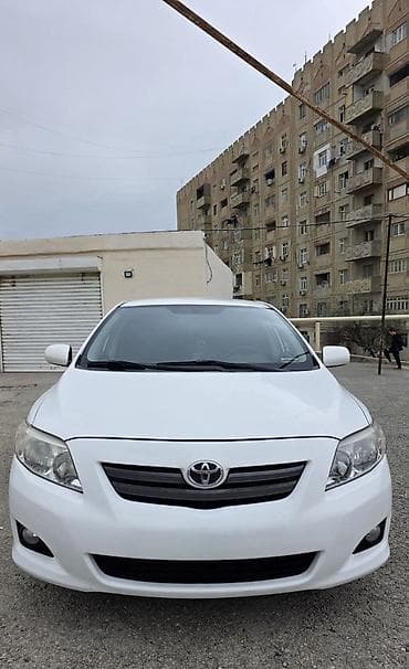 annaite teker: Toyota Corolla XLE/LE sedan – ağ rəng, 4 qapılı, ön/yan aerodinamik — 1