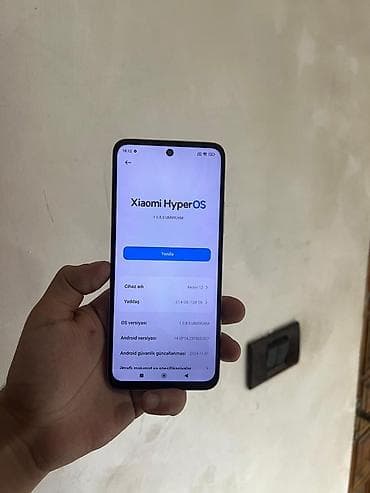 telefon bakı: Redmi 12, 128 GB, rəng - Boz, Barmaq izi, Face ID — 9