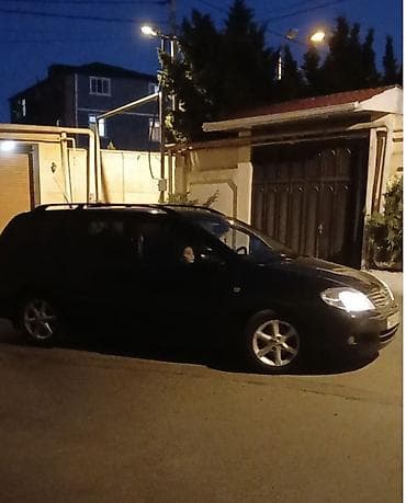 niva ucuz: Toyota Corolla: 1.4 l | 2005 il Universal — 2