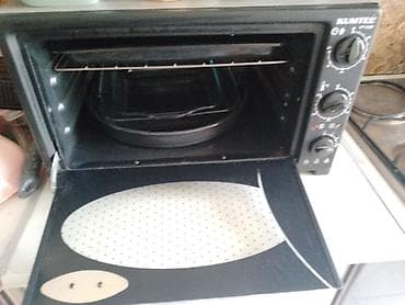 efba soba: KUMTEL KF 5520 elektrik mini soba - Kompakt stolüstü dizayn, mətbəxdə — 1