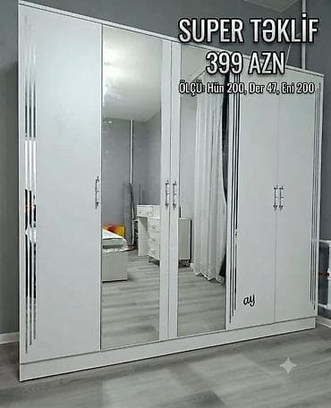 Ağ rəngli, müasir dizaynlı 4 qapılı geyim dolabı. Ön hissədə iki böyük lalafo.az -da Ağ rəngli, müasir dizaynlı 4 qapılı geyim dolabı. Ön hissədə iki böyük
