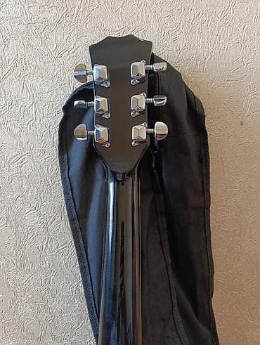 Musiqi alətləri: Əla vəziyyətdə gitara satılır, öz çantası var, ətraflı məlumat üçün — 2