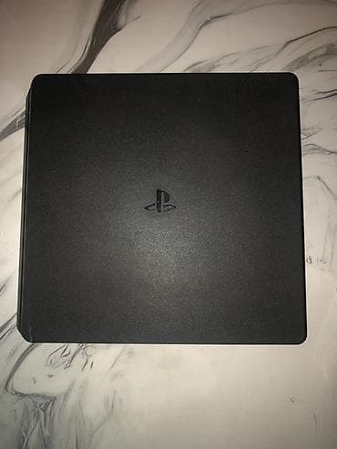 plesteyşın 2 ikinci el: Salam Playstation 4 Slim 1TB 1 pultnan icində 20dən cox oyun var — 1