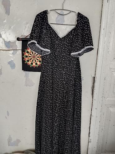 Qara rəngli, ağ xırda nöqtəli uzun don. - Model: A-kəsim, yerə qədər