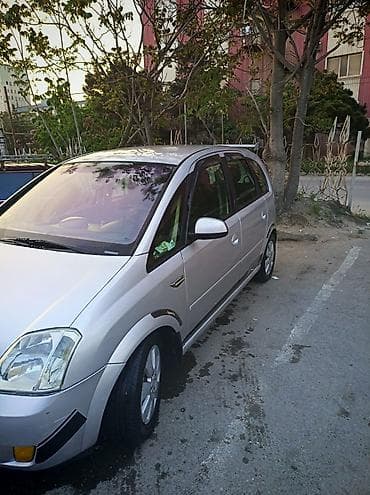 jeep fara: Opel Meriva, gümüşü rəng, 5 qapı, şəhər və ailə istifadəsi üçün rahat — 4