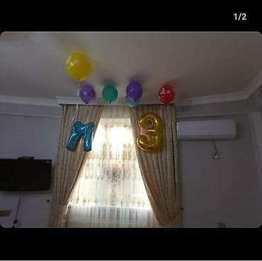 qiz sekileri: Pərdə qraqlıqları qızılı rəngdə — 1