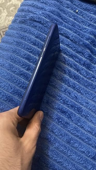 telefon ucun printer: Smartfon – ekranda damla tipli ön kamera çıxıntısı olan, maviyə çalan — 3