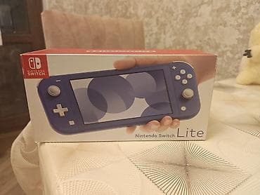 nintendo switch qiymeti: Nintendo Switch Lite (mavi) - Portativ oyun konsolu – yalnız əl — 1