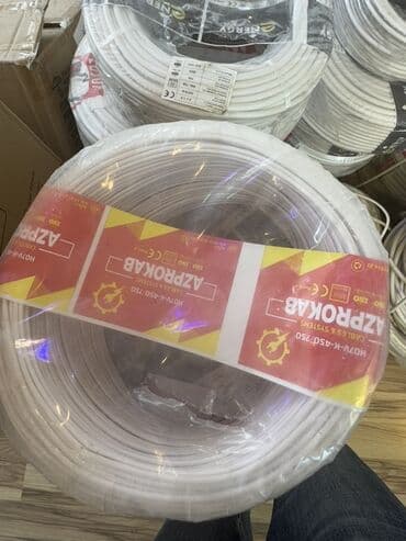 Elektrik kabelləri: AZPROKAB markalı, ağ rəngdə, rulon şəklində elektrik kabeli. Kabel
