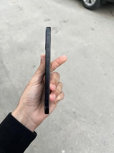 kabelər: IPhone 15, 128 GB, Black Titanium, Simsiz şarj, Face ID — 4