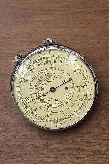 Satılır retro mexaniki hesablayıcı (circular slide rule). Elektrik və