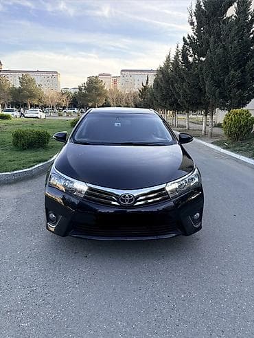 Toyota Corolla: 1.6 l | 2014 il Sedan