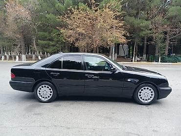 lider disk cerime: Mercedes-Benz E-Class: 2.4 l | 1998 il Sedan — 9