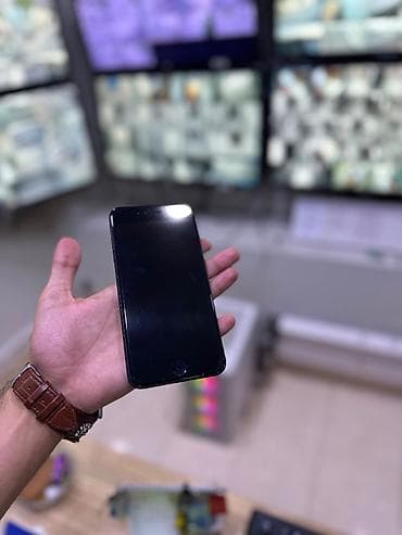 ip 9 plus: IPhone 7 Plus, 128 GB, Black Titanium — 2