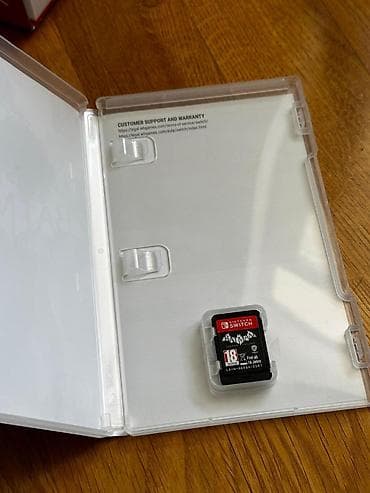 video dvd: Nintendo Switch OLED (neon mavi/qırmızı Joy‑Con) + Batman: Arkham — 5