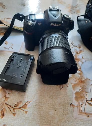 Фотоаппараты: Nikon D90 DSLR fotoaparat dəsti Xüsusiyyətlər və tərkib: - Korpus — 7