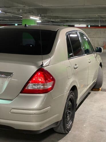 mercedes disk teker type 1 per page 40: Nissan Tiida sedan - Kül rəngə çalan açıq-bej eksteryer - 4 qapılı — 6