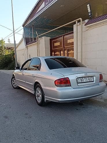 opel vectra c: Hyundai Sonata: 2 l | 2003 il Sedan — 10
