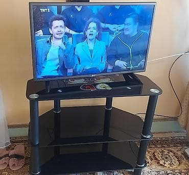 televizo: LG televizor + şüşə TV stendi - 82 Ekran - Pultu var Televizor — 2