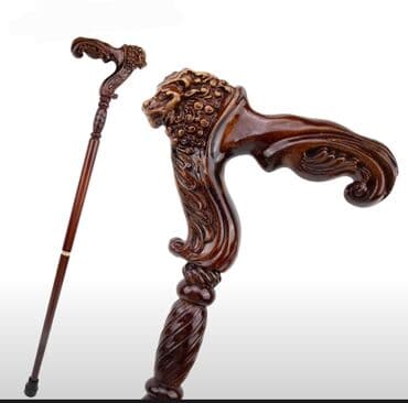 taxta cellek: Qəhvəyi rəngdə, aslan başı formalı dəstəyi olan taxta əsa. Dəstəyin — 1