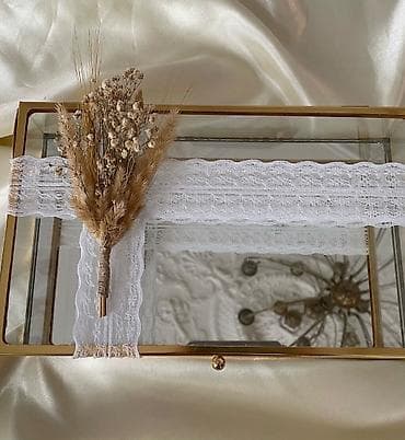 kuklalar evi: Xoncaların kirayesı 6 azn dır. 3 eded şirniyyat xonçası ve guzgulu — 7