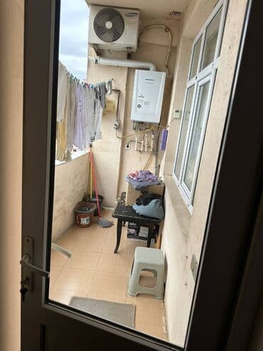 7 ci mikrorayon yeni tikili: Nərimanov rayonu,Nənəmin təndirinin yanında,2 otaqlı,təmirli,əşyalı — 7