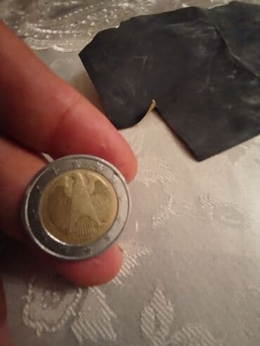 1000 rubul nece manatdir: Məhsul: 2 avro sikkəsi – Almaniya Təsvir: - Nominal: 2 EUR - Ölkə — 2