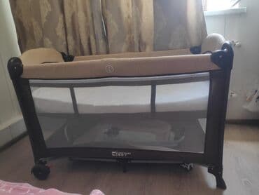 uwaq ucun manej: Bu, körpələr üçün nəzərdə tutulmuş, tünd qəhvəyi və bej rənglərdə olan — 4