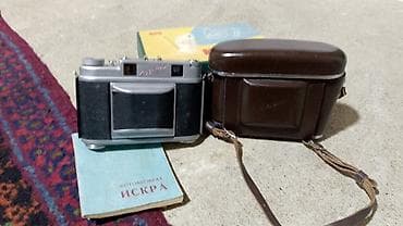 Фотоаппараты: İskra orta format plyonka fotoaparatı Xüsusiyyətlər: - Model: “ИСКРА” — 1