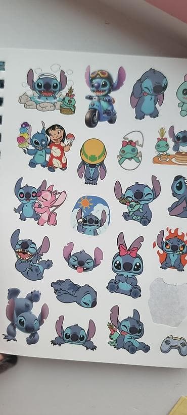 sevgililer ucun hediyyeler: Məhsul: Cizgi qəhrəmanlı yapışqanlı dəftər və stiker dəsti ikisi bir — 10