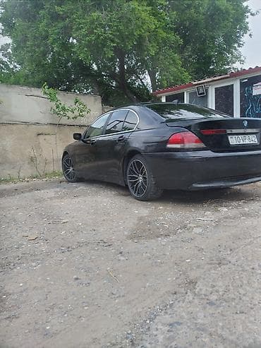 opel vectra a: BMW 7 Series (E65) sedan – qara rəngli, tam ölçülü premium sedan — 5