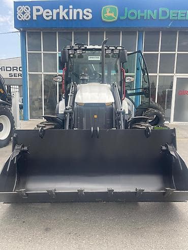 Hidromek HMK 102B Alfa kazıyıcı-yükləyici - Güclü ön kovası və arxa
