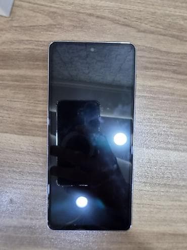 dubay iphone 16: Samsung Galaxy A73 5G, 128 GB, rəng - Boz, İki sim kartlı — 1