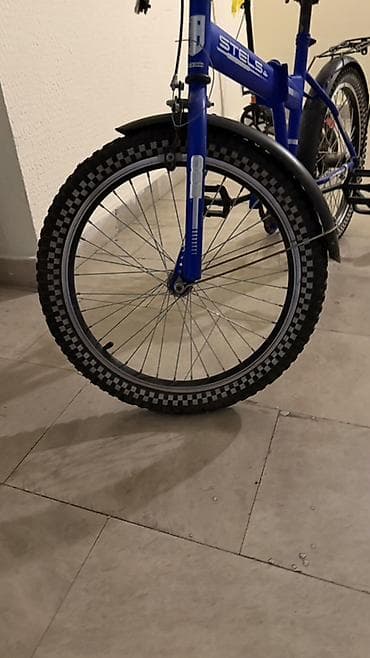 balaca velosiped: Uşaq velosipedi – STELS markalı, mavi rəng. Xüsusiyyətlər: - Təkər — 2
